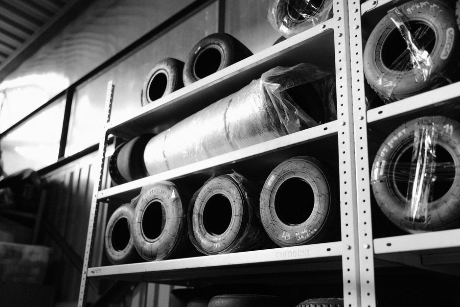 Tires organized neatly on warehouse racks
